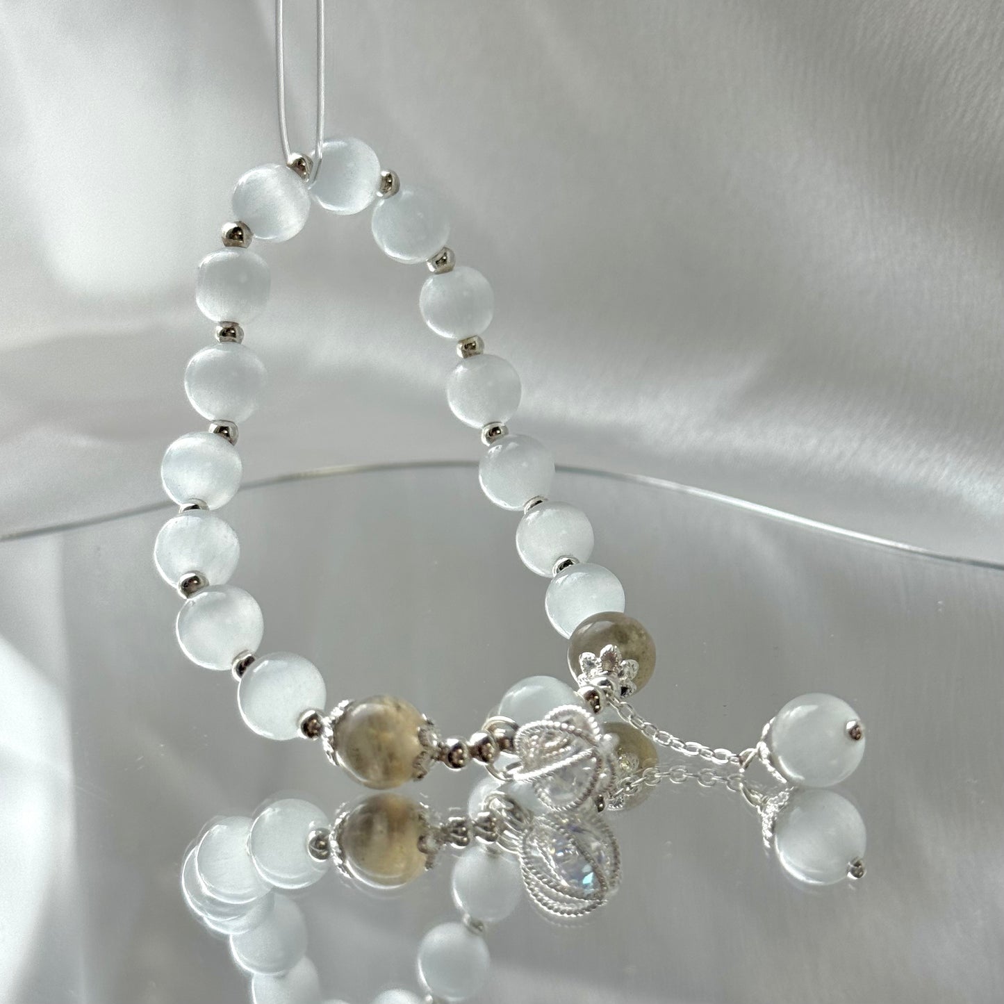 Glücksperlenarmband aus Katzenauge und Mondstein