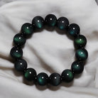 Green Eye Obsidian Wealth Bracelet fabric