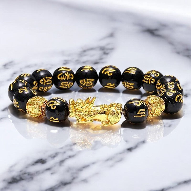 Feng_Shui_Pixiu_Black_Obsidian_Bracelet_Marble_Backdrop